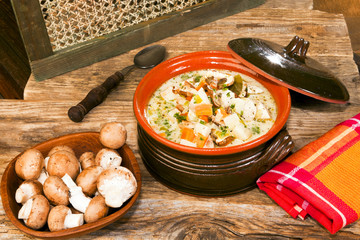 Mushroom soup served with country style.