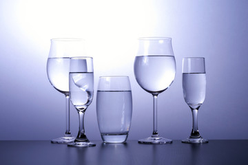Glasses beautifully lit, minimalist style.
