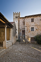 Fototapeta premium Loggia, tower and stone houses in Sv.Lovrec