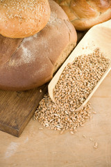 bakery products and grain on wood