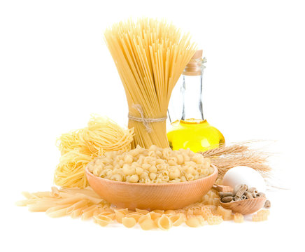 pasta and wooden plate on white