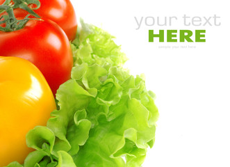 Tomato on salad leaf