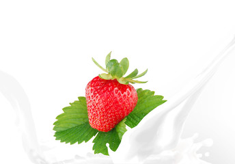 Splashing milk with strawberry