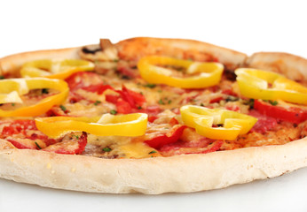 delicious pizza with sausage and vegetables isolated on white