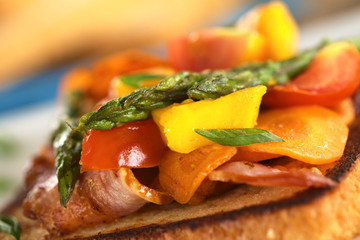 Baked asparagus, mango, tomato, carrot, bacon sandwich