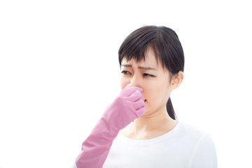 Fototapeta premium 鼻をつまむ女性