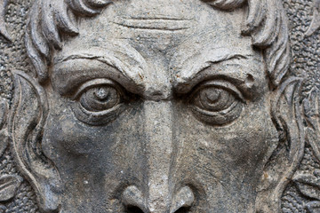 Fototapeta na wymiar Close up of carved face