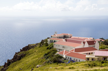 village typical architecture on cliff over Caribbean Sea on 