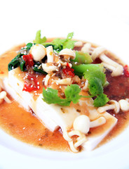 Chinese tofu with xo sauce and mushroom on white background