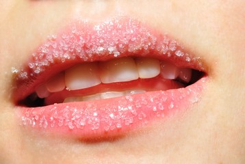 Close up macro of young woman's sweet lips