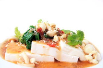 Chinese tofu with xo sauce and mushroom on white background