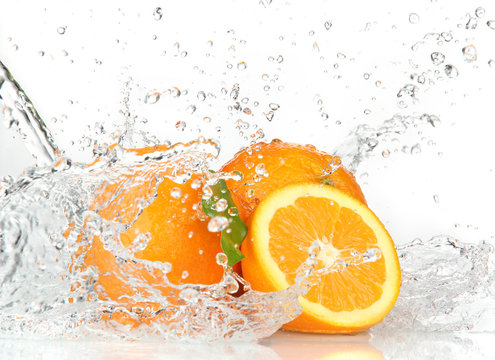 Fototapeta Pomarańczowe owoce z zalewaniem