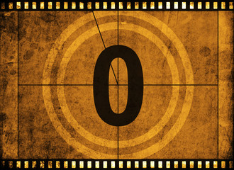 movie film strip with countdown number on grunge background
