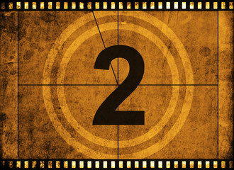 movie film strip with countdown number on grunge background