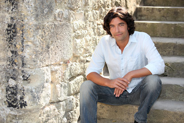 Man sitting on stairs