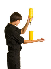 bartender does a trick with a shaker and bottle