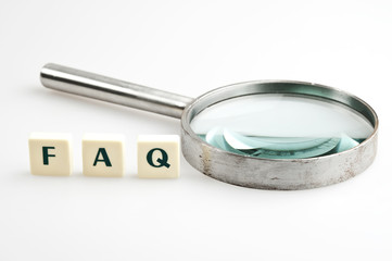 FAQ word and magnifying glass