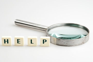 Help word and magnifying glass