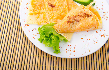 Pumpkin stuffed panckes in the plate