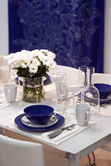 White and blue dining table in restaurant