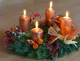 Orange advent wreath on white background