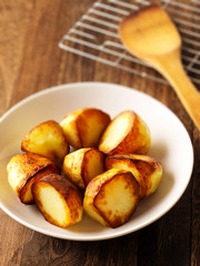 close up of a bowl of roasted potatoes