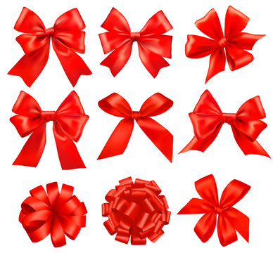 Big set of red gift bows with ribbons. Vector.