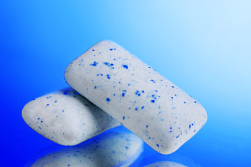 chewing gums on blue background