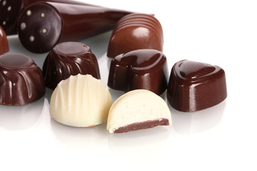 Many different chocolate candy isolated on white