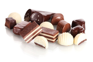 Many different chocolate candy isolated on white