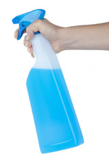 hand squirting a bottle of cleaning spray
