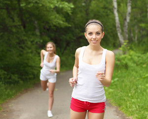 Fototapeta premium Young woman doing sport outdoors