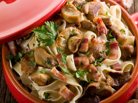 Tagliatelle With Cep Edible Mushroom And Bacon Over Casserole