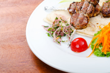 Meat cuisine - kebab served in plate