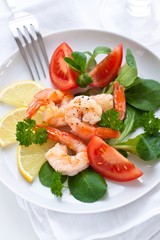 Prawns with corn salad, tomatoes and lemon