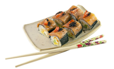 japanesse salmon rolls topped with fresh strawberry