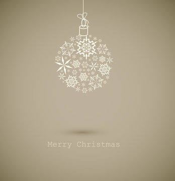 Christmas ball made from gray snowflakes on gray background