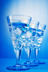 Water in the glass against gradient background