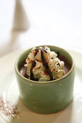 honey dripping from drizzler on top of jar, 