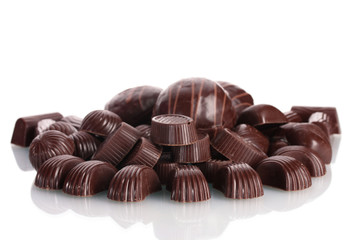 Many different chocolate candy isolated on white