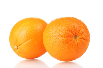 two ripe oranges isolated on white