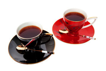 two cups of tea isolated over a white background