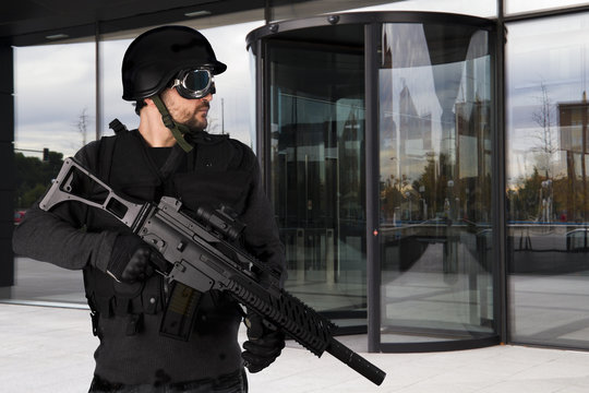 Defense companies, armed police wearing bulletproof vests