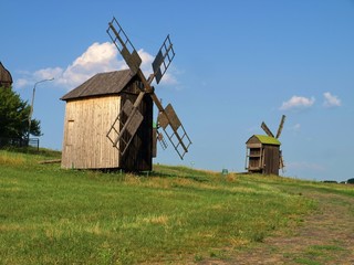 Fototapeta na wymiar Old windmills in Pirogovo, Ukraine