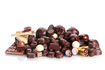 Many different chocolate candy isolated on white