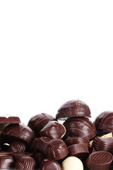Many different chocolate candy isolated on white
