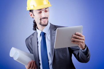 Construction worker working on tablet