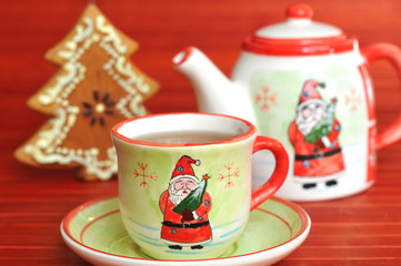 Tea pot, cup and candy fir