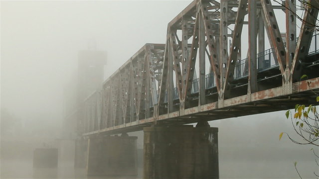 Pan of Bridge in Fog