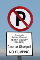 no parking and dumping sign on a cliff edge